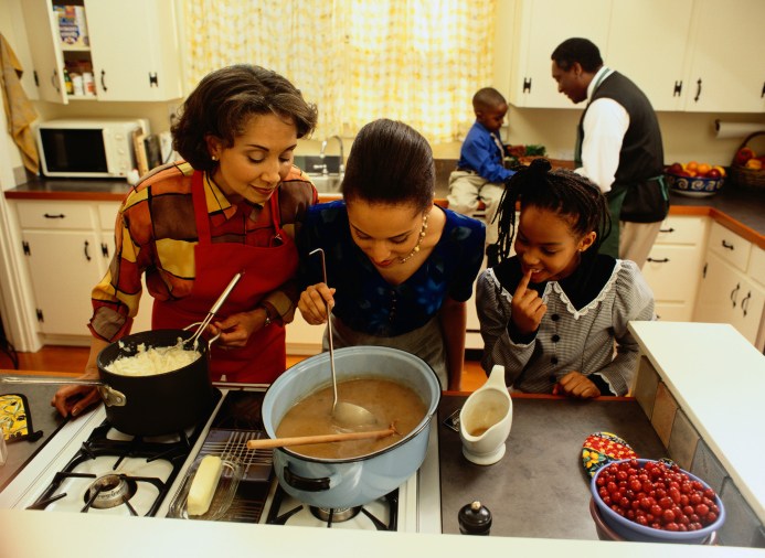 Women Cooking Thanksgiving Gravy