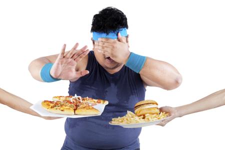 Fat man rejecting junk foods